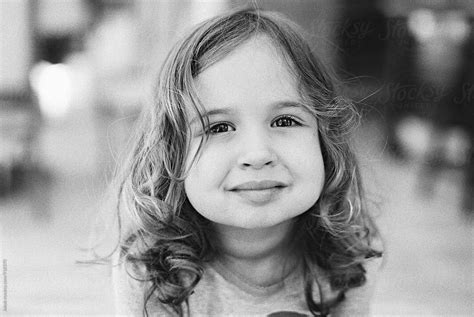 Black And White Portrait Of A Cute Young Girl With Big Cheeks By Jakob