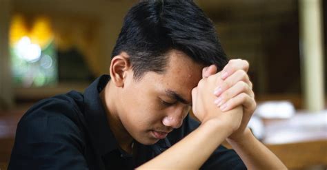Close Up Of A Man Praying · Free Stock Photo