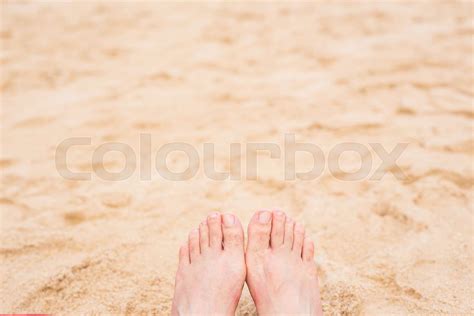 Holiday Concept Woman Feet Close Up Relaxing On Beach Stock Image