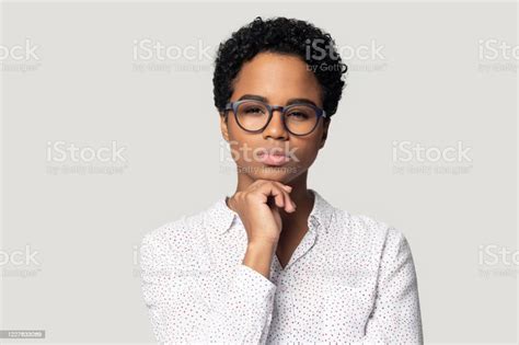 African Woman In Glasses Staring At Camera Suspect Something Stock