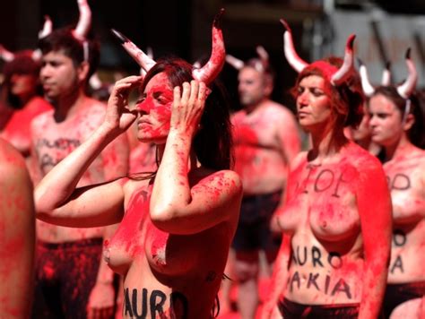 Watch Dozens Of Topless Activists Protest Bullfighting Before The