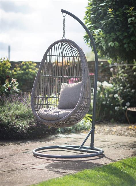 Our All Weather Rattan Hanging Nest Chair Comes With Its Own Stand