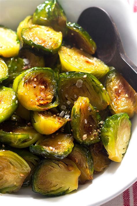 Roughly cut the garlic cloves into 4 to 5 pieces each and add to mixing bowl. Pan-Roasted Brussel Sprouts Recipe in Maple Garlic Butter ...