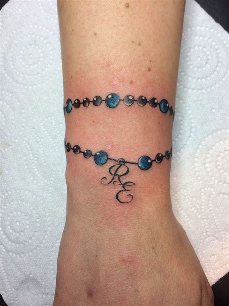 Pin By Esther Velez On Tattoo Wrist Bracelet Tattoo