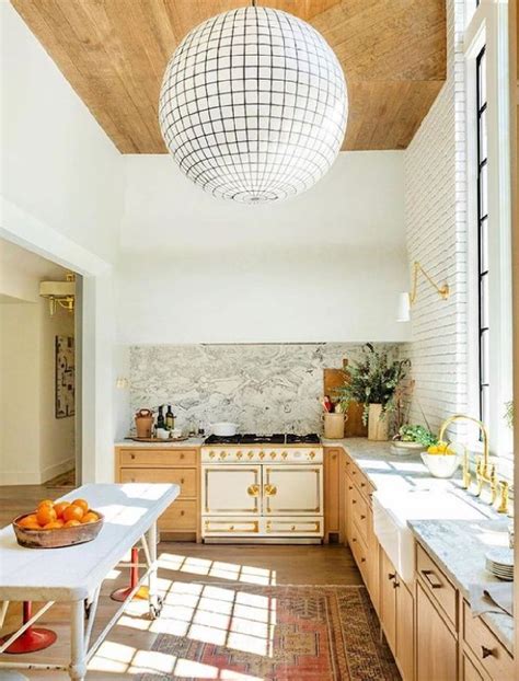 Lofty Ceiling In A Timeless European Inspired Kitchen With Architecture