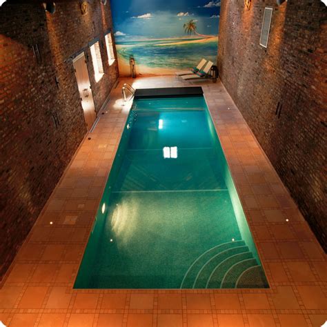 Set on the rooftop of a modern apartment, this small wading pool is more for fun than serious swimming. Indoor Swimming Pool Designs | Home Designing