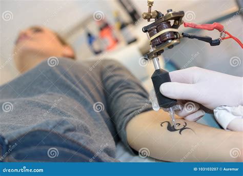 Woman Getting Tattoo Stock Image Image Of Concentration 103103207