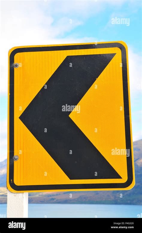 Road Sign Arrow Pointing Left Stock Photo Alamy