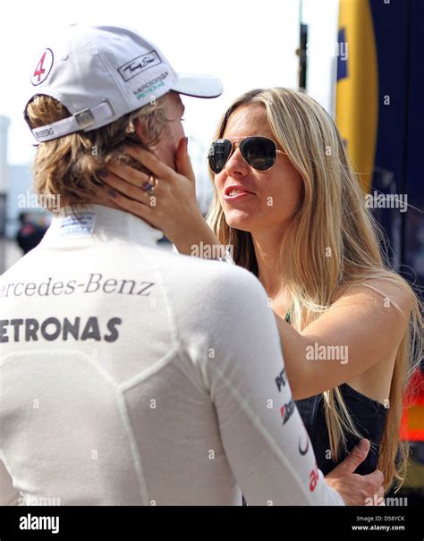 German Nico Rosberg Of Mercedes Gp Says Goodbye To His Girlfriend Vivian Sibold After The