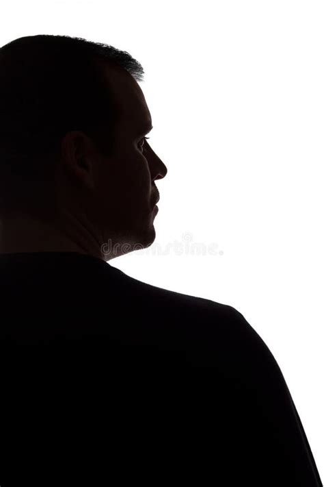 Portrait Of A Young Man Back View Dark Isolated Silhouette Stock