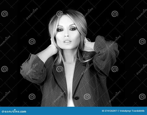 Woman In Office Casual Suit On Naked Body On Dark Background Business Style Concept Stock