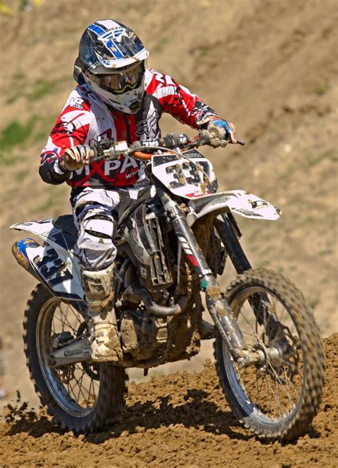 Person Riding A Motocross Dirt Bike Free Image Peakpx