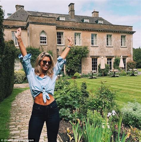 Natasha Oakley Flashes Her Washboard Abs In A Cropped Shirt In England