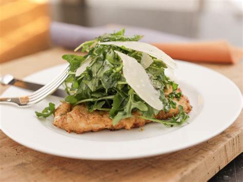 Ina garten never gets too fussy with food trends or adds unnecessary ingredients—in fact, most of her recipes use staples that you probably have in your house garten's got one. Lemon Parmesan Chicken with Arugula Salad Topping Recipe ...
