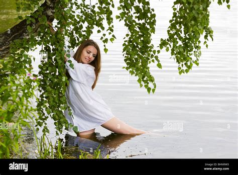 Young Woman Relaxing On The Lake Stock Photo Alamy
