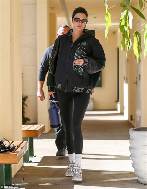 kendall jenner looks sporty in an oversize nike jacket as she heads to pilates with hailey
