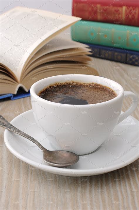 Cup Of Coffee On A Table Among Book High Quality Food Images