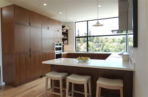 Some models can cook food lightning fast, using higher wattage to. Gorgeous walnut modern kitchen with top of the line Jen ...