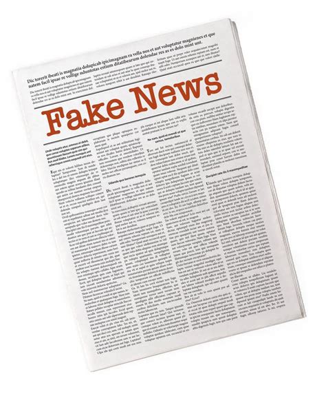 Newspaper With Headline Of Fake News Isolated On White Stock Photo