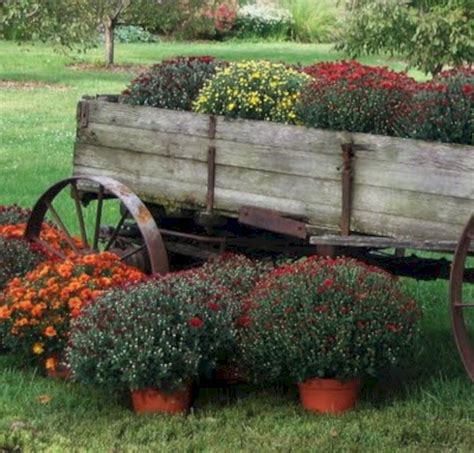 Pin By Avis Andrulli On Beautiful Containers Fall Mums Garden Cart