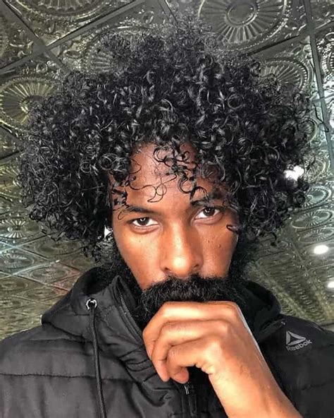12 Standout Curly Hairstyles For Black Men 2020 Trends
