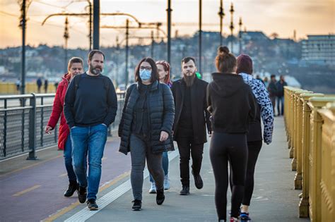 People Of Budapest Wearing Face Mask And Walking On Margaret Bridge