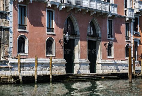 elements of architecture of houses on the streets of the canals of the city of venice stock