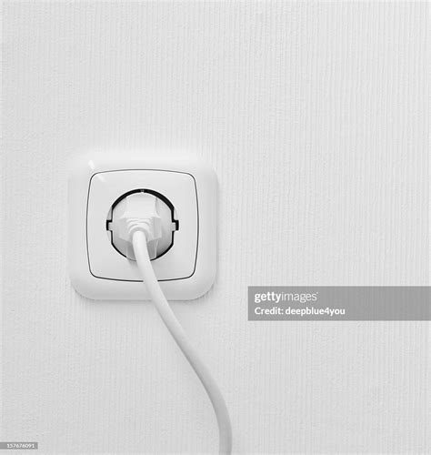 Brand New Outlet On A White Wall With Plug High Res Stock Photo Getty