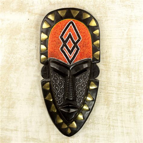 Hand Crafted African Wood Mask With Beads And Brass Accents Beaded
