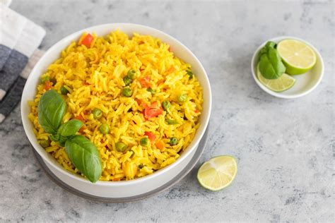 Veggie yellow rice get its vibrant yellow color from healthful turmeric spice. Easy Thai Yellow Rice Recipe