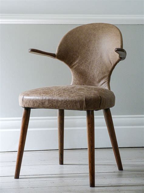 A unique vintage danish leather armchair. Vintage Mid-Century European Leather Chair - Ormston Saint ...