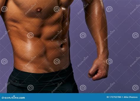 Cropped Image Of Fit Slim Man Showing Six Pack Abs Stock Photo Image