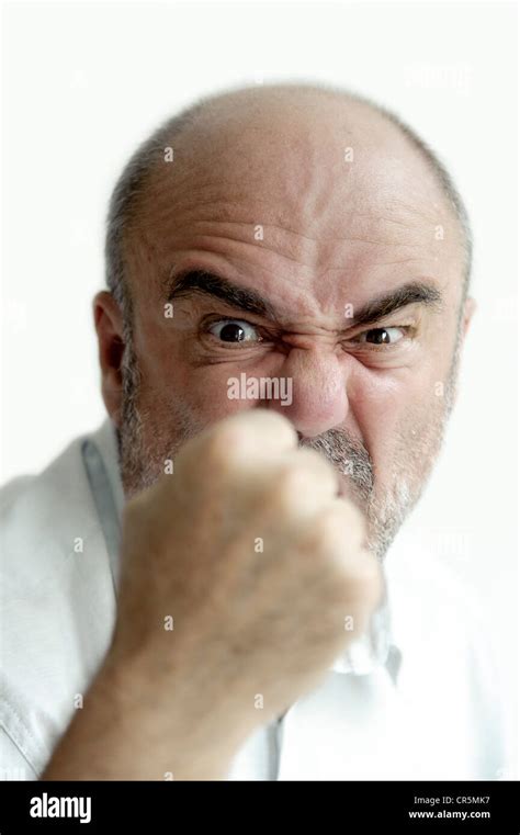 Angry Man Threatening With His Fist Stock Photo Alamy