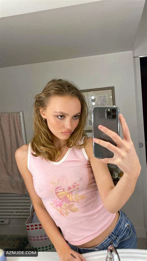 Lily Rose Depp Showed Her Big Hard Nipples While Posing In A Pink Top