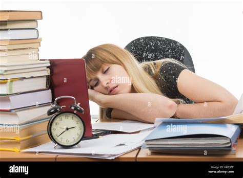Student Fell Asleep At His Desk Preparing For An Exam Stock Photo Alamy
