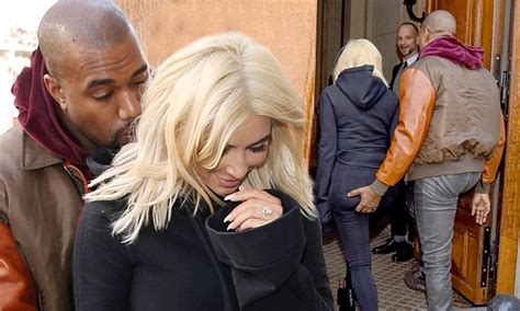 Kim Kardashian Gets The Giggles As Over Amorous Kanye West Makes A Grab