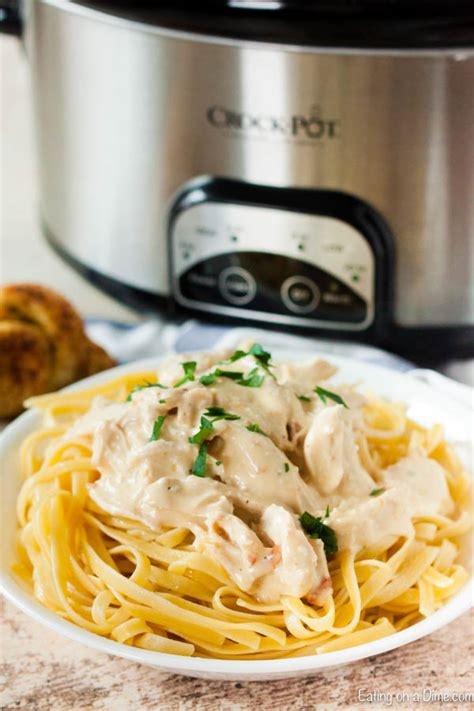 This meal is just as delicious as my one pot fettuccine alfredo (stovetop version) and a classic comfort food. Easy Crock Pot Chicken Alfredo - Slow Cooker Chicken ...