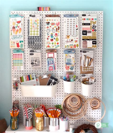 I think the splurge on the ikea buckets & rod system is so beautiful & it really stands out. Upcycled Craft Room Organization - Pebbles, Inc.
