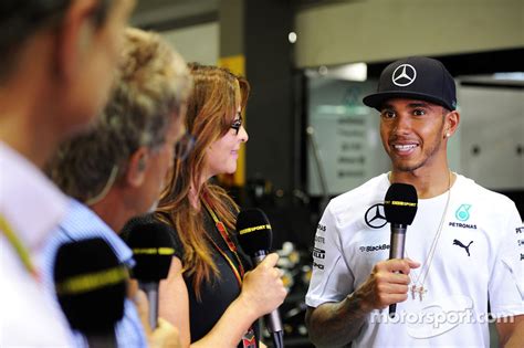 How much salaries commentators of formula 1 broadcasting team get paid. Lewis Hamilton, Mercedes AMG F1 with Suzi Perry, BBC F1 ...