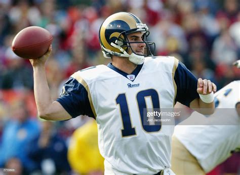 quarterback marc bulger of the st louis rams goes for the pass news photo getty images