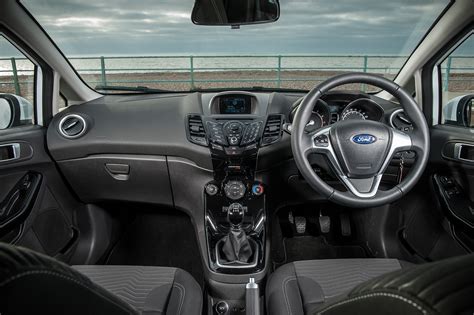 Compare in car entertainment system, driving comfort and visibility with similar cars. Ford Fiesta 2008-2017 interior | Autocar