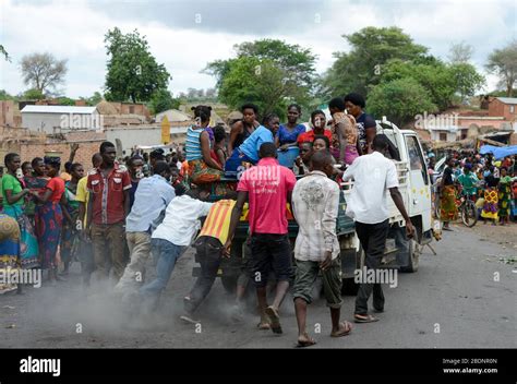 Zambia Sinazongwe Rural Market In Village Men Push A Breakdown Mini