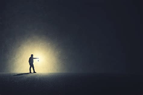 Man With Lamp Walking Illuminating His Path Stock Photo Download