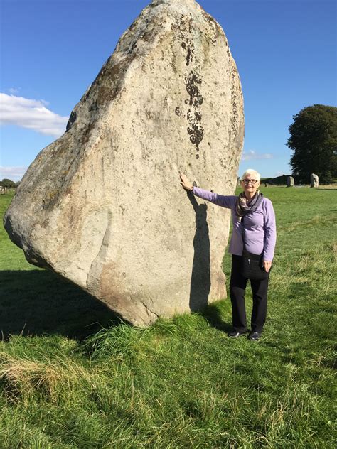 In Front Of One Of The Rocks At Avebury There Are Three Large Rings