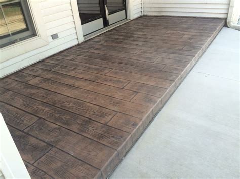 Coble field brick layer concrete patio. JMS Concrete Co Wood Stamped Concrete Patio - JMS Concrete Co