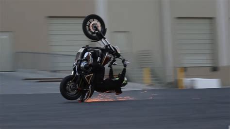 Watch A Harley Davidson Crash While Stunting The Drive