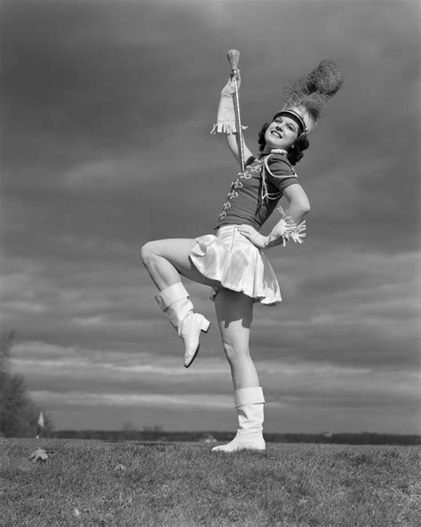 1940s Woman Drum Major In Majorette Band Uniform Twirling Baton Posters