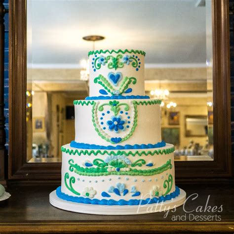 Photo Of A Green Blue Wedding Cake Pattys Cakes And Desserts