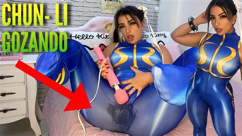 Sexy Cosplay Girl Dressed As Chun Li From Street Fighter Playing With