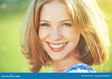 Happy Beautiful Young Woman Laughing And Smiling On Nature Stock Image